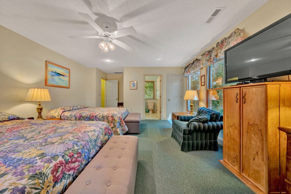 Upper level master suite with two Queen beds, plenty of room to rejuvenate in your own space