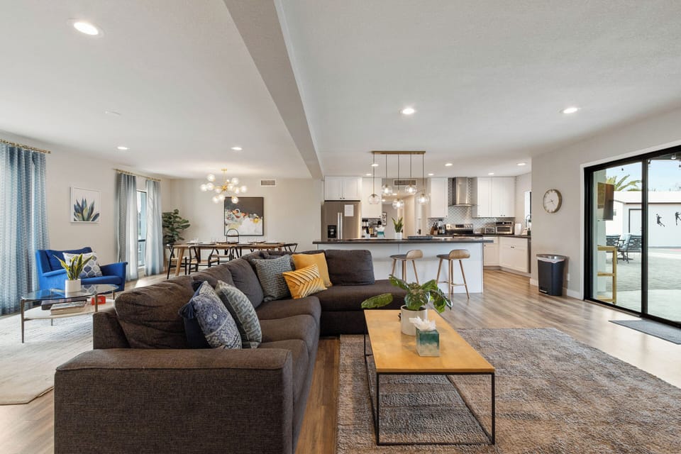 Living Room with TV, cozy sectional, and modern decor