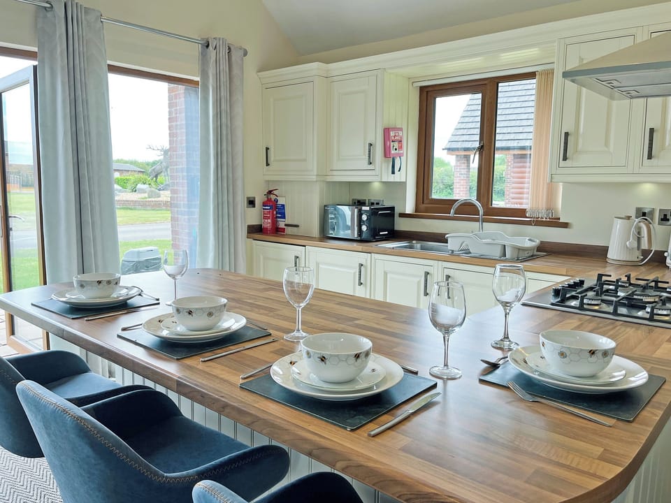 Kitchen area | Jasmine Lodge, Fitling