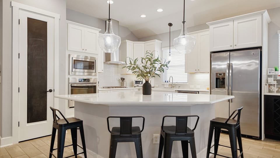Enjoy making delicious meals in the chef's kitchen, complete with a huge island