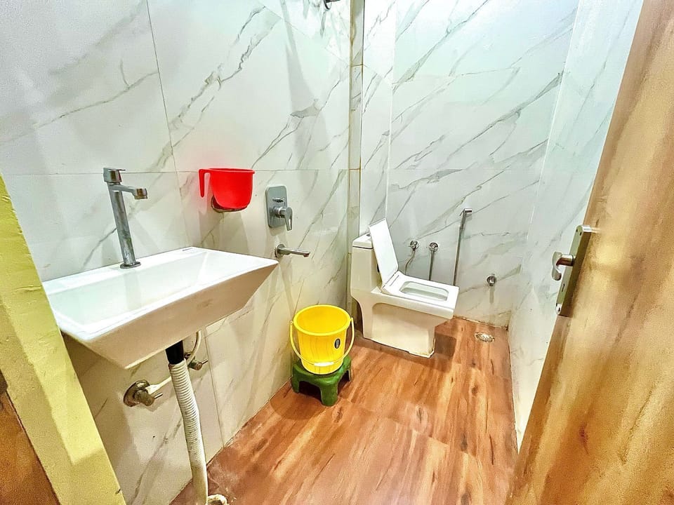 Shower, free toiletries, hair dryer, slippers
