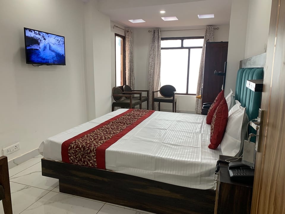 Deluxe Double Room, Balcony, Garden View | Laptop workspace, free WiFi