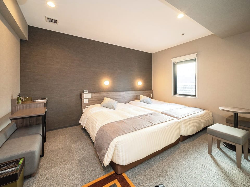 Twin Room, 2 Double Beds, Non Smoking (Max occupancy includes children) | Down comforters, desk, laptop workspace, iron/ironing board (on request)