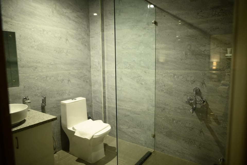 Premium Room, City View | Bathroom | Shower, hair dryer, slippers, bidet
