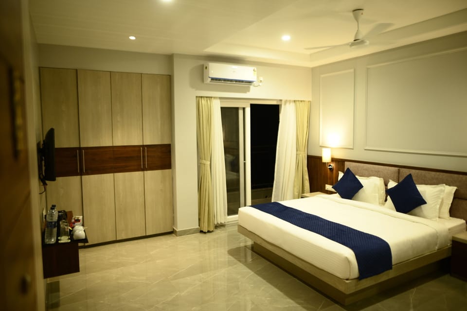 Premium Room, City View | In-room safe, desk, laptop workspace, blackout drapes