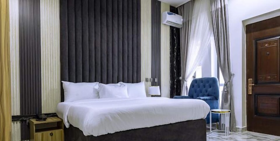 Junior Room, Balcony, City View | Desk, laptop workspace, blackout drapes, soundproofing