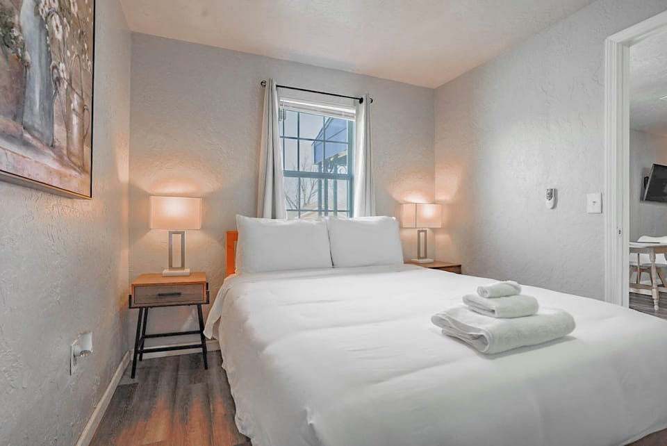 This inviting bedroom offers the perfect balance of comfort, privacy, and simplicity