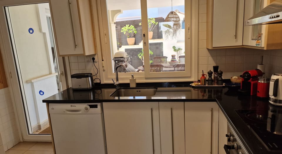 Villa | Private kitchen | Fridge, microwave, oven, stovetop