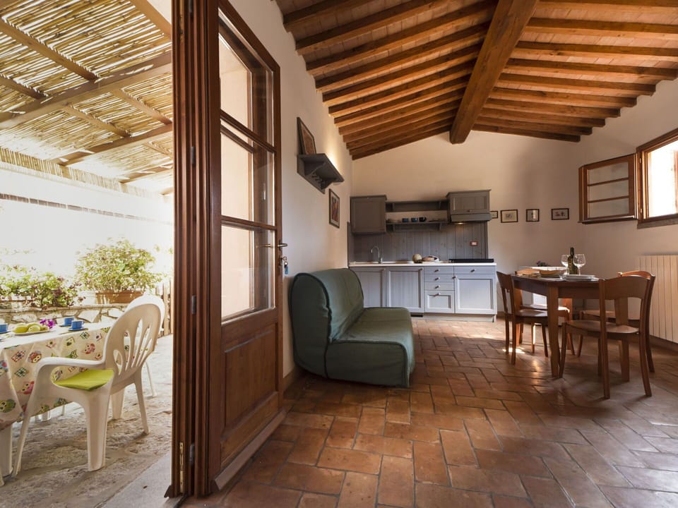 Furniture, Interior Design, Flooring, Wall, Floor, Wood, Ceiling, Room, Table, Chair