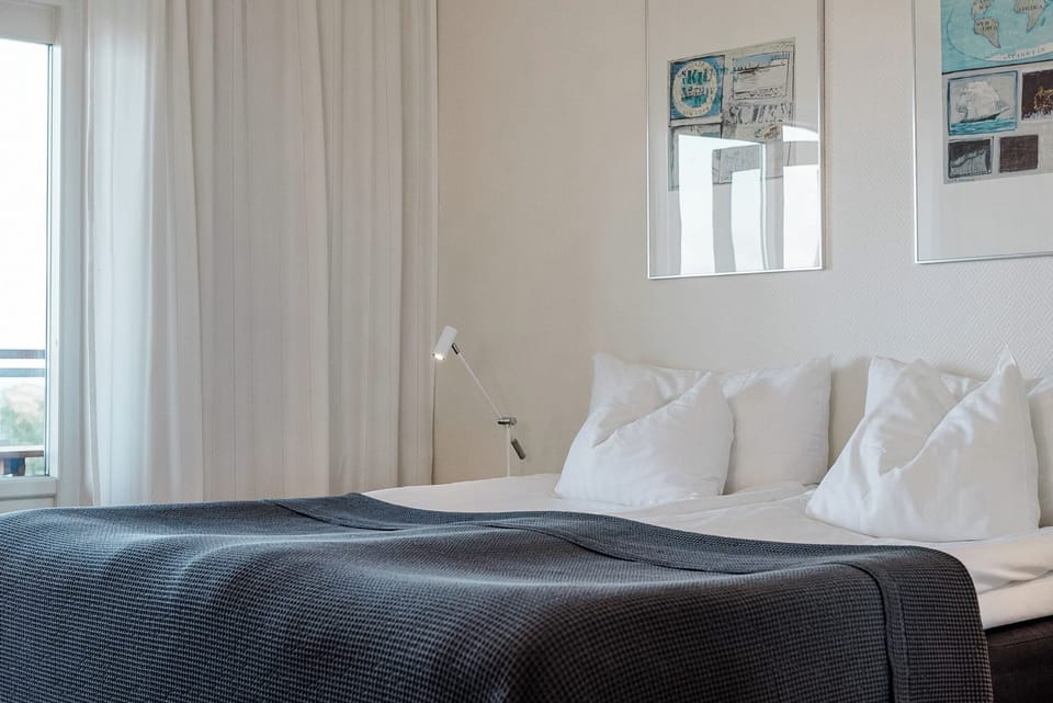 Double or Twin Room, Balcony, Sea View | Hypo-allergenic bedding available, blackout drapes, iron/ironing board