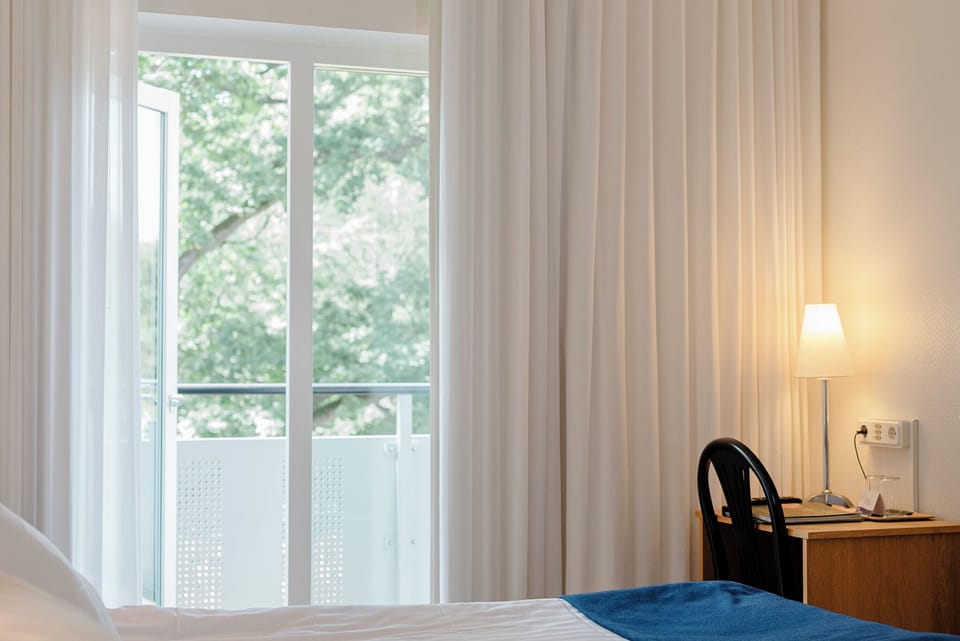 Hypo-allergenic bedding available, blackout drapes, iron/ironing board