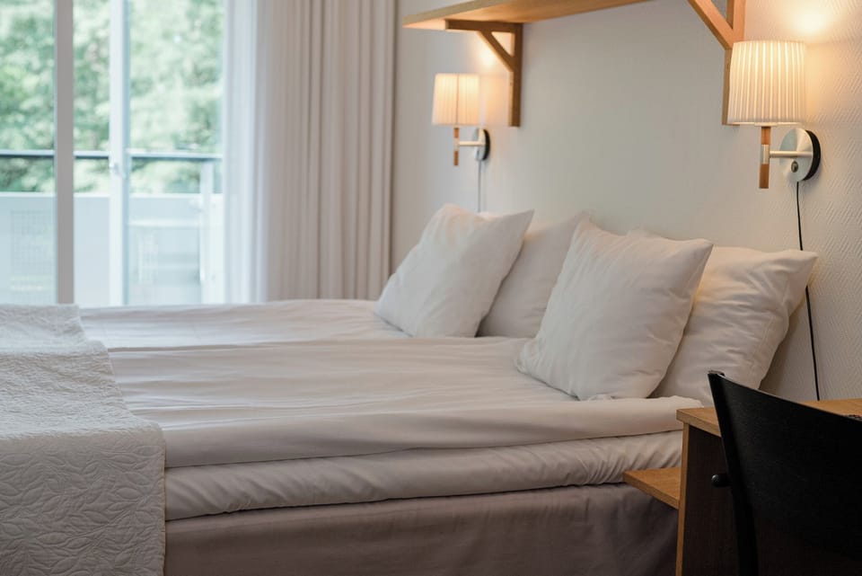 Double Room, Balcony, Park View | Hypo-allergenic bedding available, blackout drapes, iron/ironing board