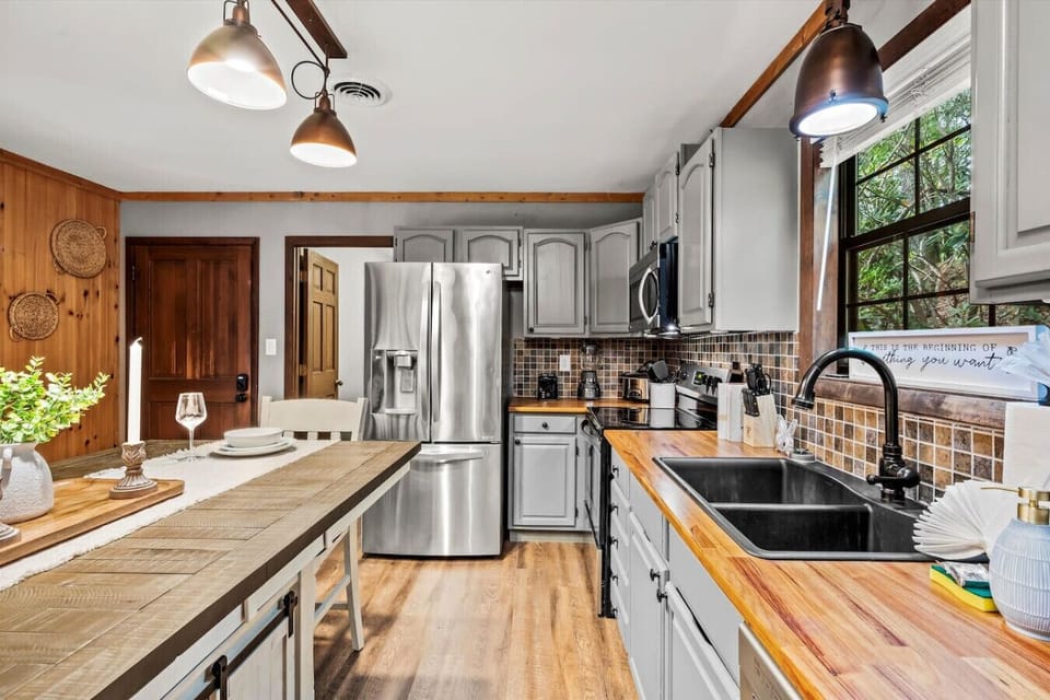 The fully-equipped kitchen includes everything you need to make delicious meals in or enjoy takeout from any of the wonderful local restaurants.