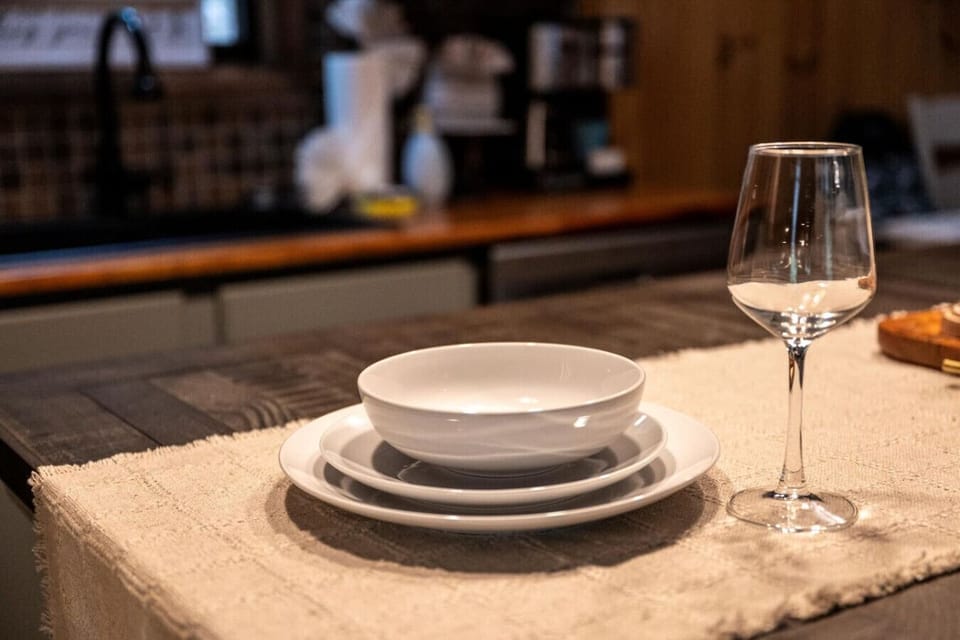 Thoughtfully set for your stay, this dining space offers cozy touches that make every meal feel special, whether it`s a morning coffee or a candlelit dinner.