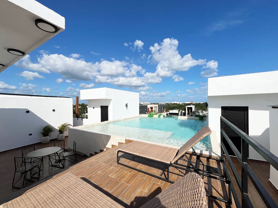 Cool off in the top-floor plunge pool, steps from our Penthouse, with jungle.