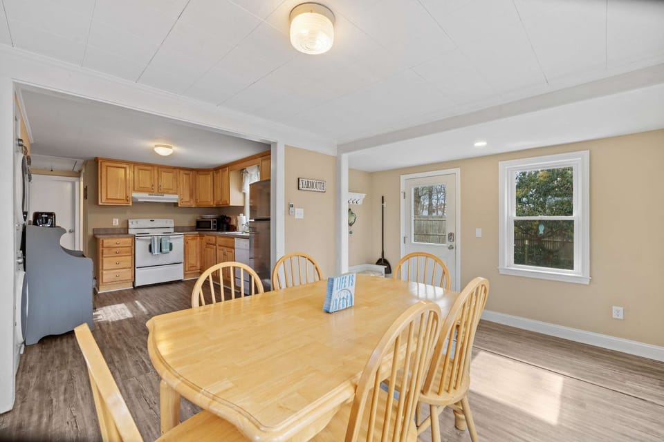 From Kitchen to Table in No Time! With an open layout connecting the dining area and kitchen, mealtime is effortless and enjoyable. Bonus: a full-size washer and dryer to keep your beachwear fresh!