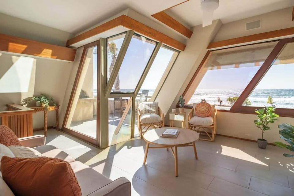Relax in the open sitting area or open up the angular door and enjoy the patio