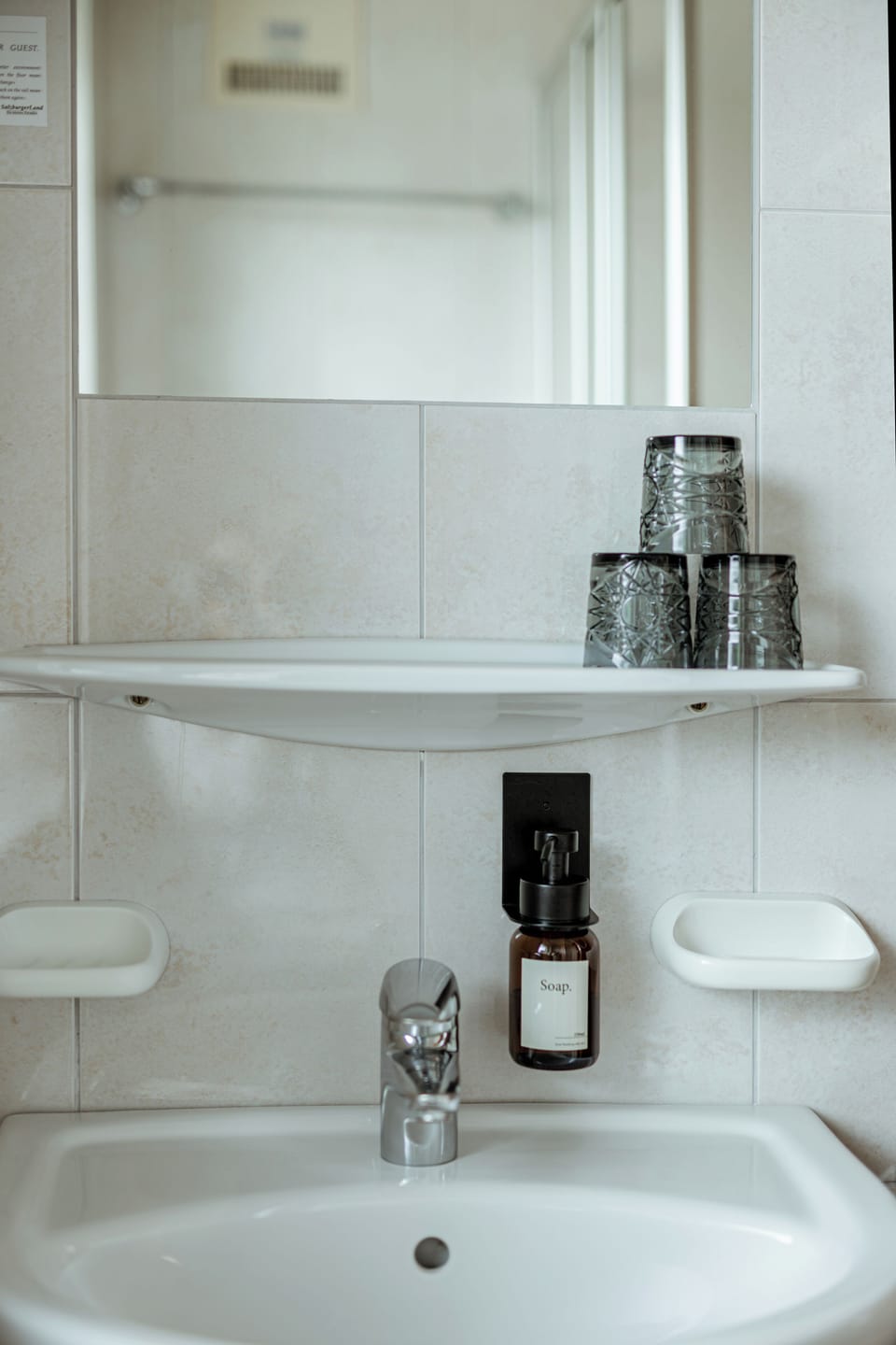 Bathtub, hair dryer, towels, soap