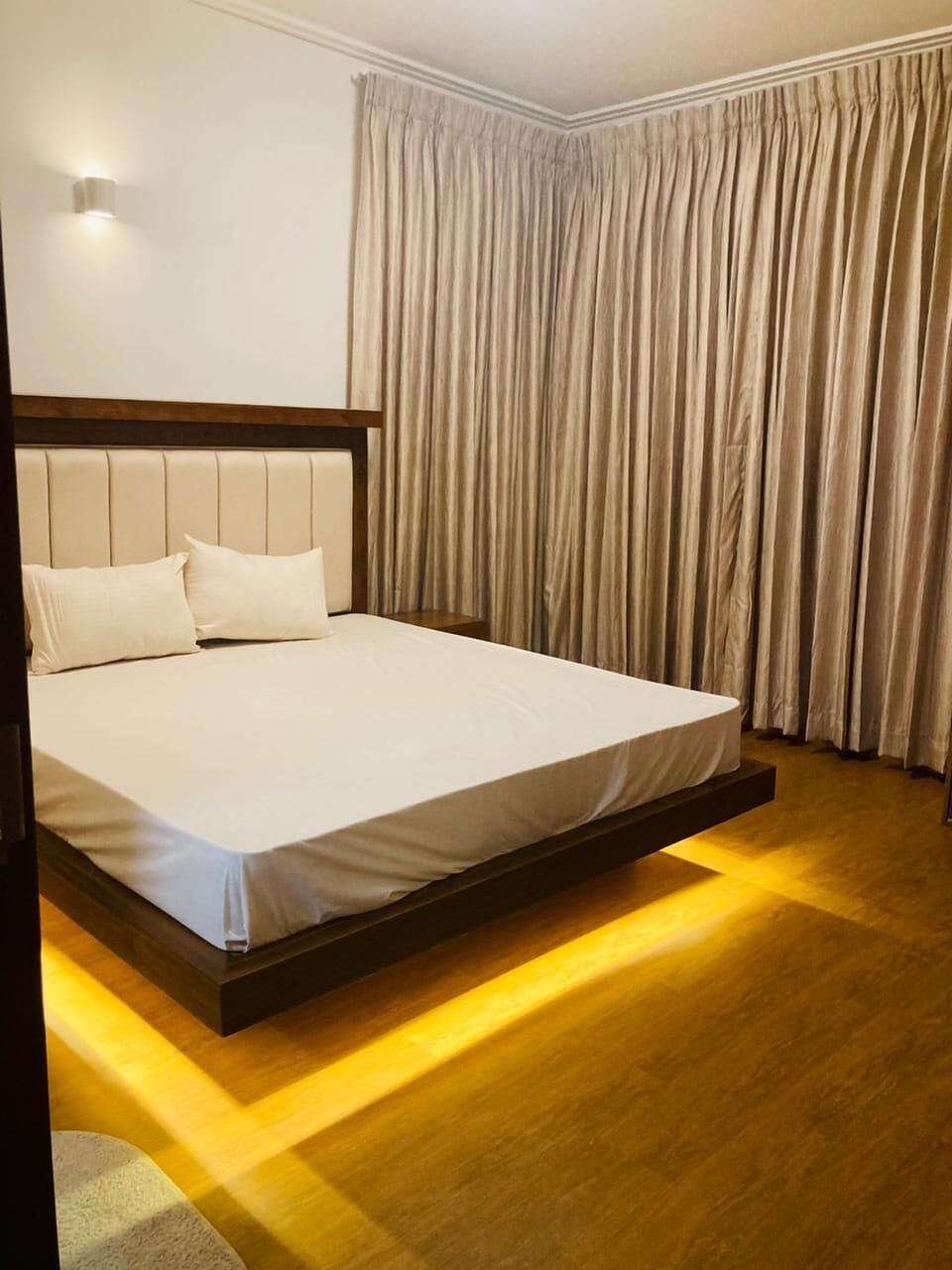 2 bedrooms, blackout drapes, soundproofing, iron/ironing board