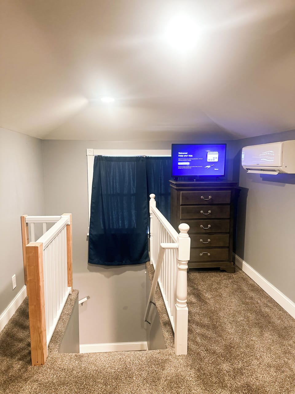 A private upstairs nook with a TV—perfect for unwinding after a day of adventure.

