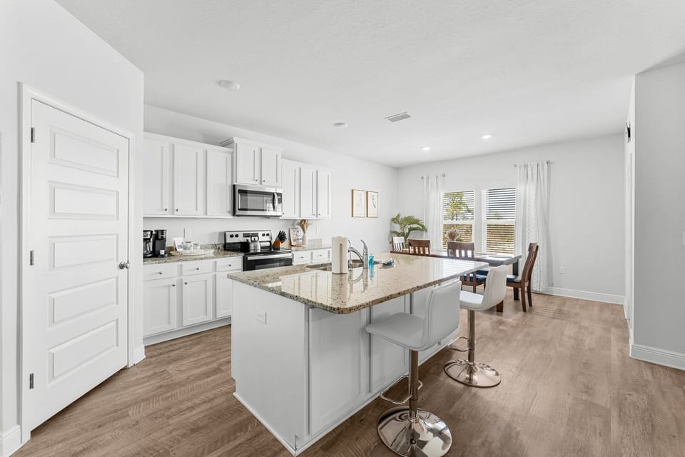 Fully stocked kitchen with modern appliances and plenty of space to cook!