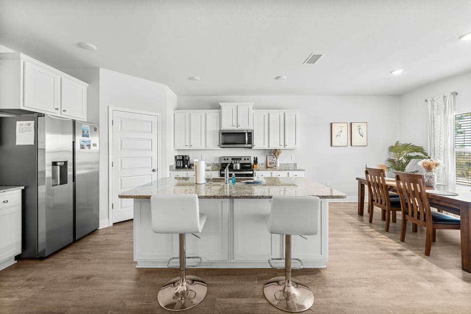 Fully stocked kitchen with modern appliances and plenty of space to cook!