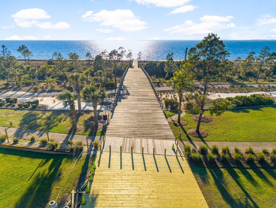 Walk to the white-sand shores and enjoy calm bay waters!
