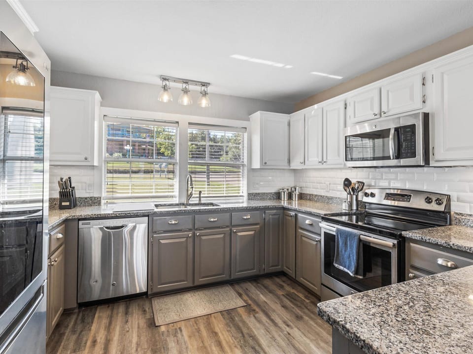 A large, fully stocked kitchen with plenty of counter space to prepare food