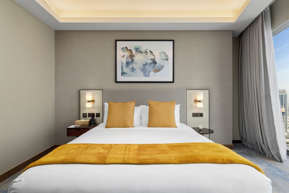 Deluxe Apartment, 2 Bedrooms, Balcony | 2 bedrooms, in-room safe, blackout drapes, iron/ironing board