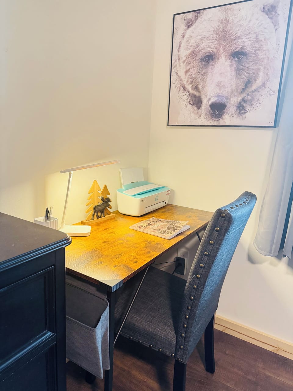 A dedicated workspace with a printer.