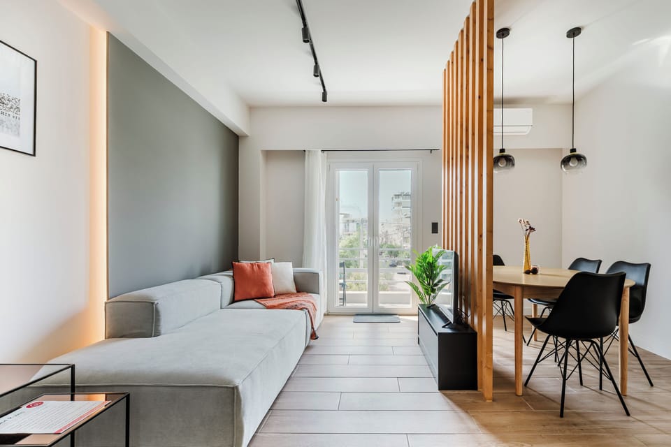 Apartment, 1 Bedroom, Balcony, City View | Living room | 42-inch Smart TV with digital channels, streaming services