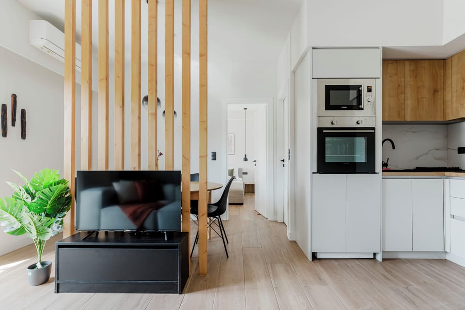 Apartment, 1 Bedroom, Balcony, City View | Living room | 42-inch Smart TV with digital channels, streaming services