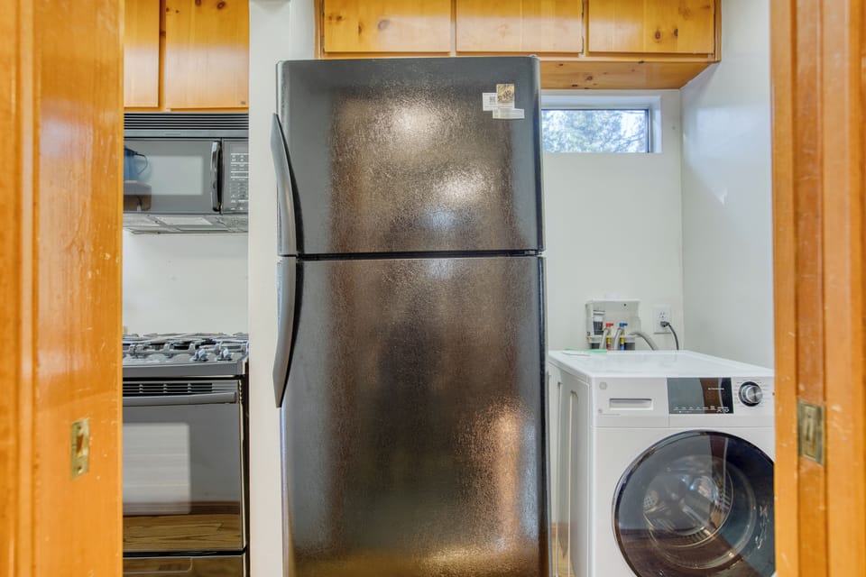 Convenient in-home laundry area with a washer/dryer combo.