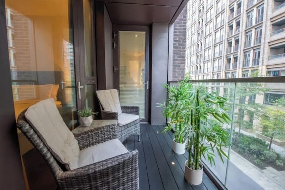 Lovely balcony with seating for two and accessible from guest and living rooms