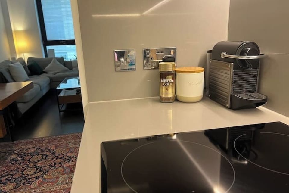 Nespresso coffee machine with capsules,  coffee and tea provided also