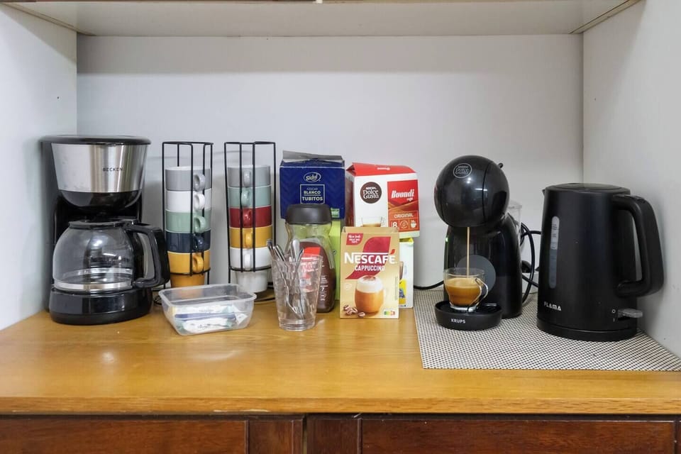 [Coffee Corner] with coffee maker, coffee, tea, electric kettle
