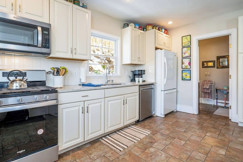 A perfect blend of classic charm and modern efficiency, this kitchen offers everything you need for a comfortable stay.