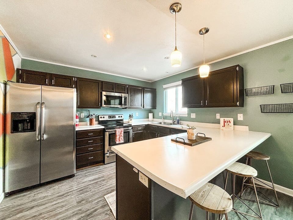 The updated kitchen is fully stocked for cooking and gathering