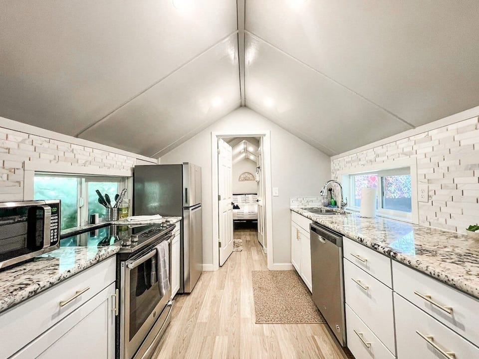 The kitchen is stocked with everything you need to cook simple meals