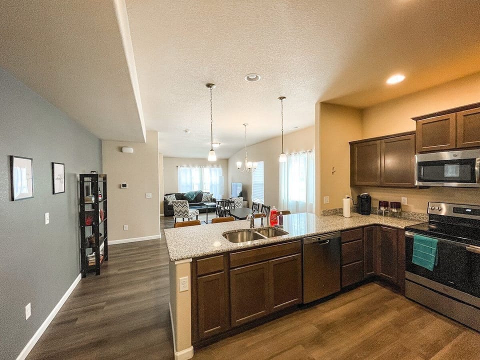 The kitchen is fully equipped with everything needed for quick visits or extended stays.