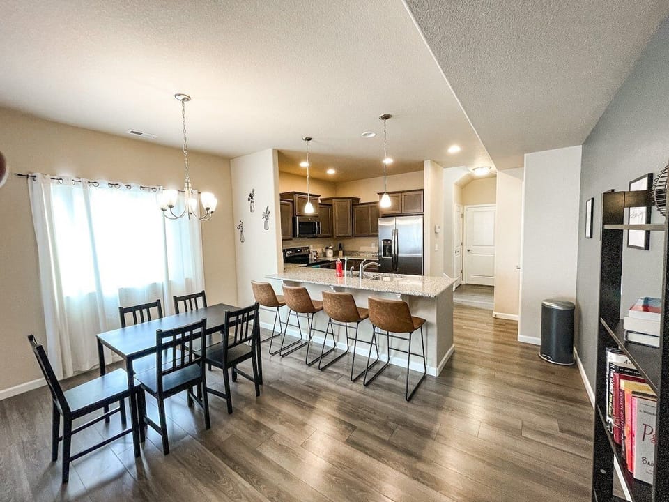 Flowing seamlessly into the dining area and updated kitchen.