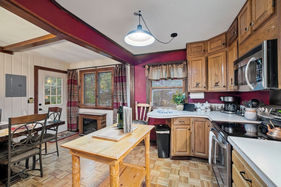 The fully equipped kitchen and dining area make gathering for meals easy after a day of exploring.