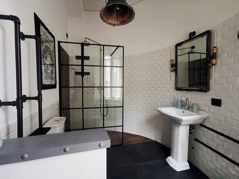 Deluxe Double Room, Patio, Garden View | Bathroom | Shower, hair dryer, towels, soap