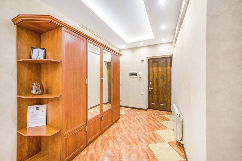 Family Apartment, Balcony | Living area | Flat-screen TV
