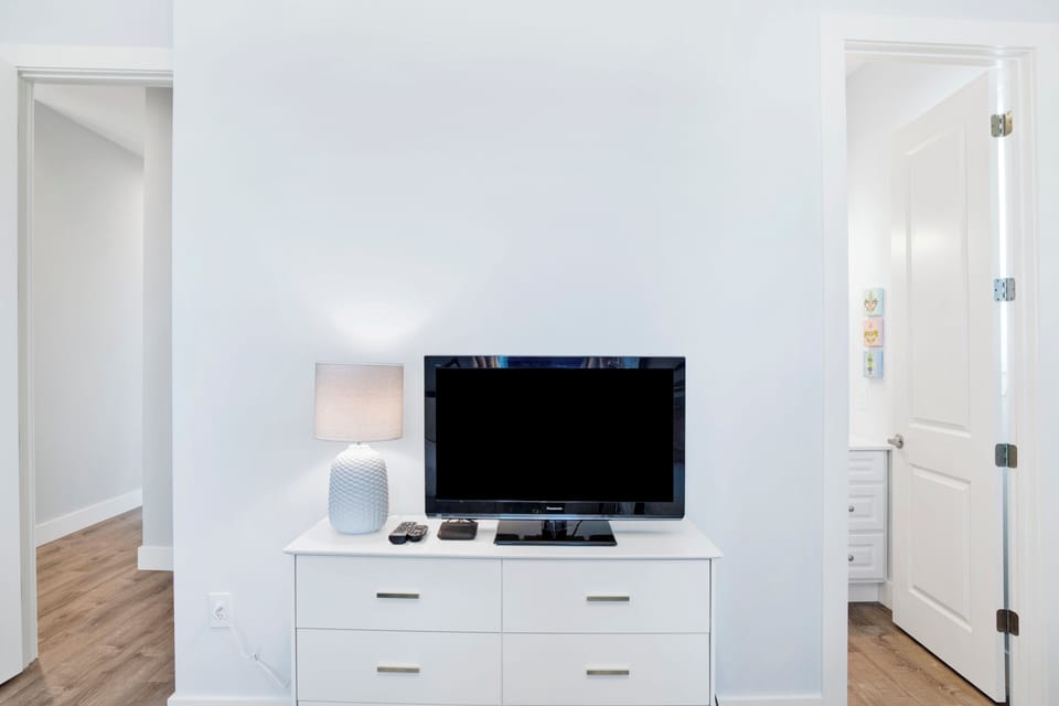 Guest bedroom 3 has a TV and private bathroom