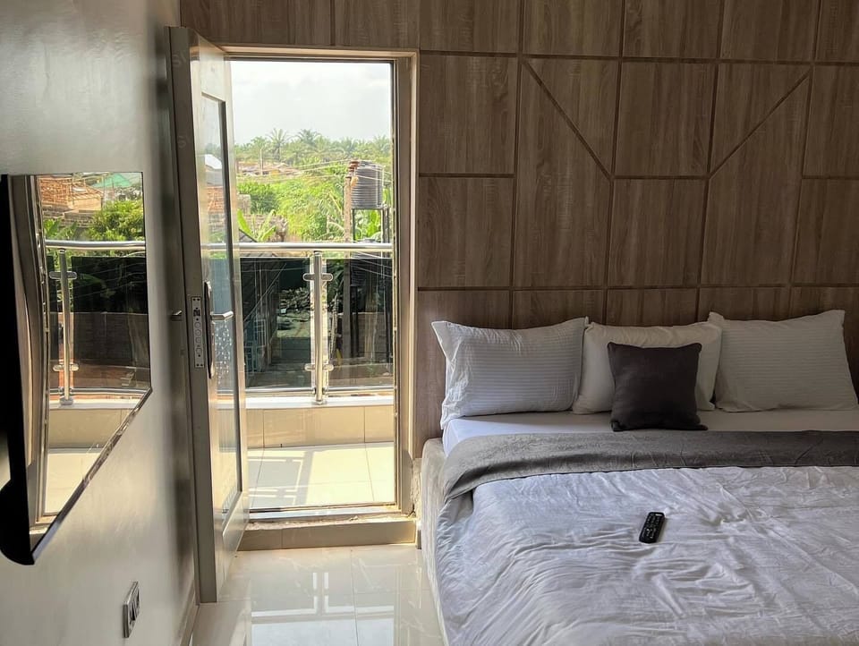 Junior Room, Balcony, City View | Desk, laptop workspace, blackout drapes, soundproofing