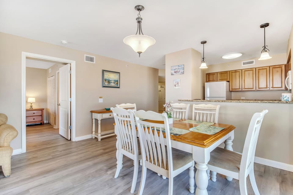Gather around your elegant dining table for memorable meals with family and friends in this beautifully appointed space.