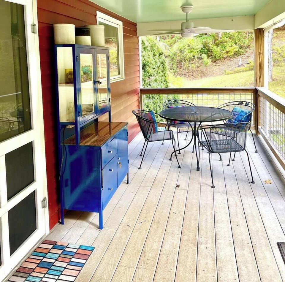 The generous porch is a great spot to eat outside. 