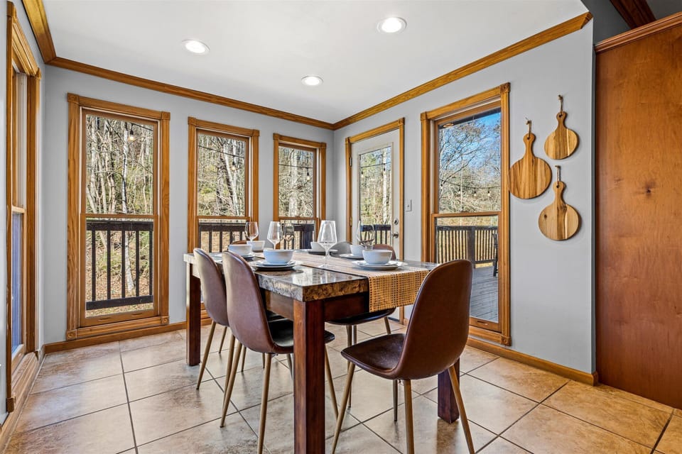 Dining table right off the kitchen with seating for 6.