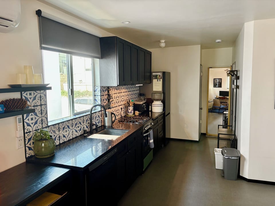 9ft counter run open kitchen & dining. compost bin. recycling. coat rack. 